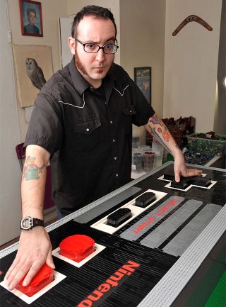 Illustration for article titled Giant Five-Foot NES Controller Is Made Out Of LEGO. And Actually Works.